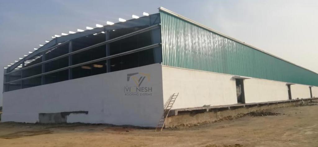 Warehouse shed construction by Vignesh Roofing Systems - durable steel sheds for storage and logistics