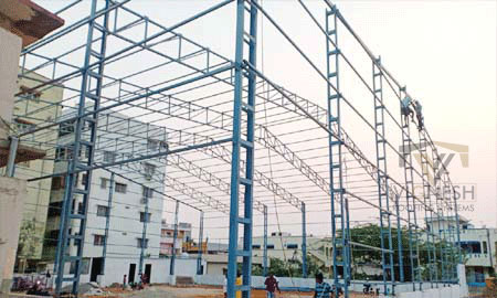 Pipe Truss Structure fabrication project at K Play Academy, SujathaNagar by Vignesh Roofing Systems - durable and quality roofing solution