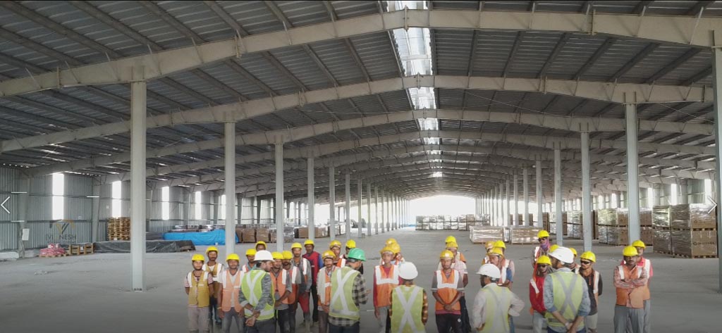 Industrial shed fabrication by Vignesh Roofing Systems - durable pre-engineered steel structures for factories and warehouses